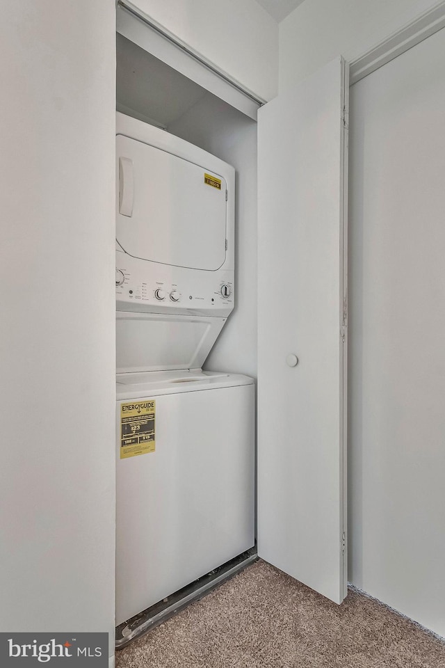 24 Helen Ct, Indian Head, MD 20640 - laundry room with estacked washer and dryer and carpet floors