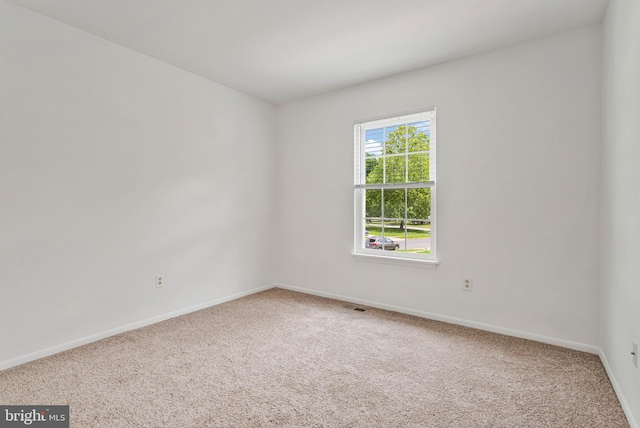 24 Helen Ct, Indian Head, MD 20640 - carpeted empty room with baseboards