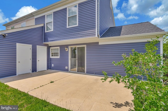 24 Helen Ct, Indian Head, MD 20640 - back of property with a patio area and roof with shingles