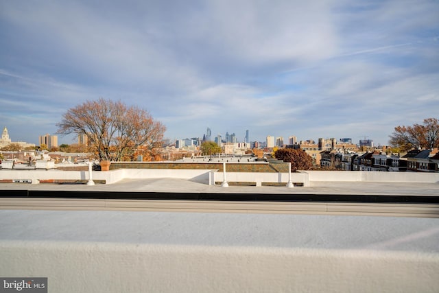 5005 Walnut St, Philadelphia, PA 19139 - view of asphalt street featuring a view of skyline and sidewalks