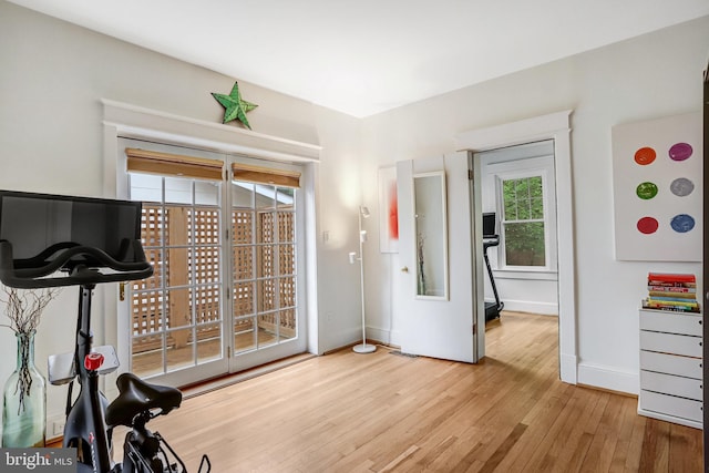 815 Aspen St NW, Washington, DC 20012 - workout area featuring wood finished floors and baseboards