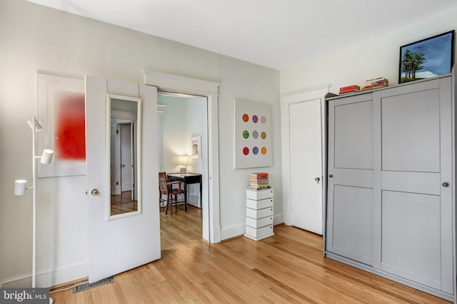 815 Aspen St NW, Washington, DC 20012 - bedroom featuring light wood-type flooring and baseboards