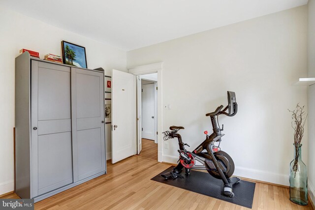 815 Aspen St NW, Washington, DC 20012 - exercise room featuring baseboards and light wood-style flooring