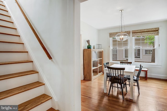 815 Aspen St NW, Washington, DC 20012 - dining room with stairway, wood finished floors, and baseboards