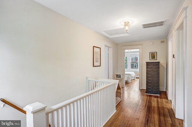 815 Aspen St NW, Washington, DC 20012 - hallway featuring an upstairs landing, attic access, and wood-type flooring