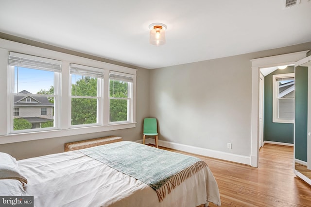 815 Aspen St NW, Washington, DC 20012 - bedroom featuring wood finished floors and baseboards