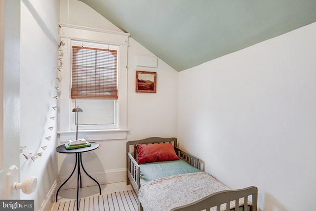 815 Aspen St NW, Washington, DC 20012 - bedroom featuring lofted ceiling and baseboards