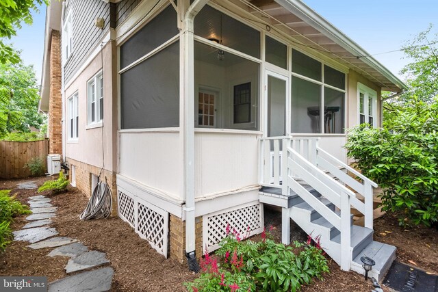 815 Aspen St NW, Washington, DC 20012 - view of side of home with a sunroom and central AC