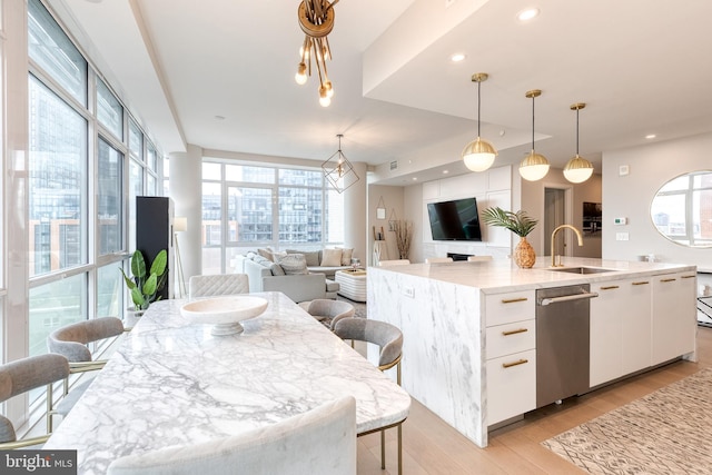 1330 Lancaster St Unit C701, Baltimore, MD 21231 - kitchen with a sink, dishwasher, plenty of natural light, white cabinets, and recessed lighting