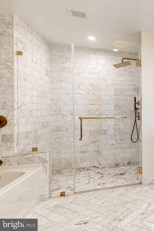 1330 Lancaster St Unit C701, Baltimore, MD 21231 - bathroom featuring a marble finish shower, a bath, and marble finish floors