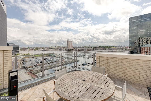1330 Lancaster St Unit C701, Baltimore, MD 21231 - balcony featuring a water view, a view of city, and outdoor dining space
