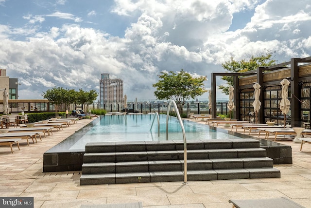 1330 Lancaster St Unit C701, Baltimore, MD 21231 - view of pool with a pool and a patio