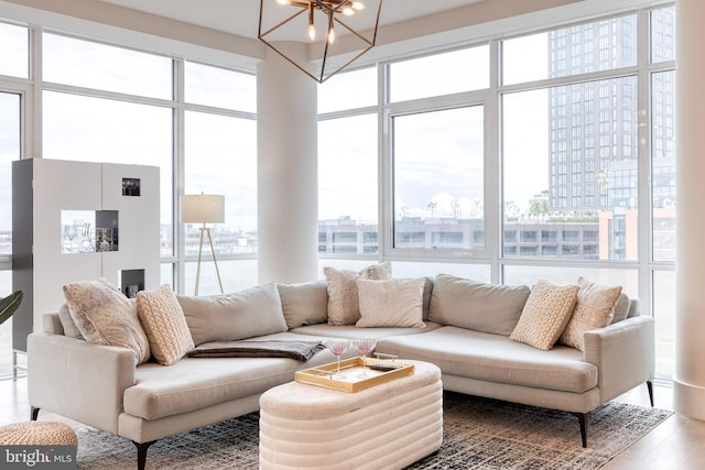 1330 Lancaster St Unit C701, Baltimore, MD 21231 - living room featuring a chandelier and wood finished floors