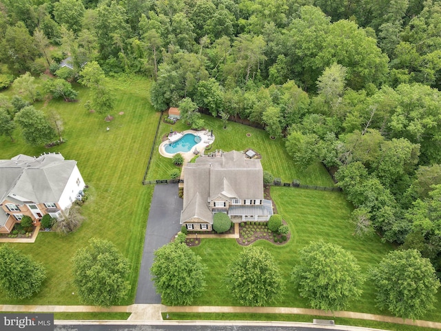 7633 Great Dover St, Gainesville, VA 20155 - aerial view of a pool area and a heavily wooded area