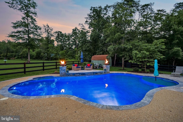 7633 Great Dover St, Gainesville, VA 20155 - view of pool with a storage shed, a patio area, a fenced backyard, and view of scattered trees