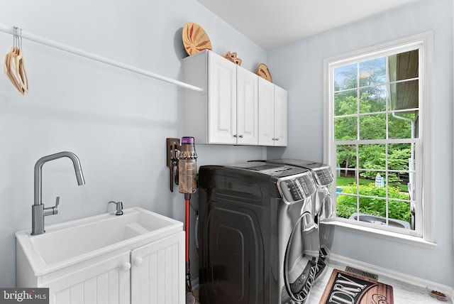 7633 Great Dover St, Gainesville, VA 20155 - laundry room featuring cabinet space and independent washer and dryer