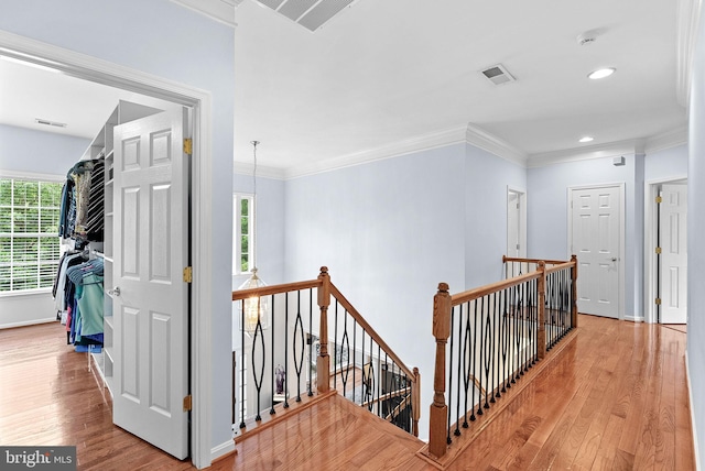 7633 Great Dover St, Gainesville, VA 20155 - corridor featuring an upstairs landing, wood finished floors, crown molding, and recessed lighting