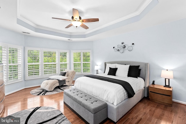 7633 Great Dover St, Gainesville, VA 20155 - bedroom with a raised ceiling, crown molding, wood finished floors, and a ceiling fan