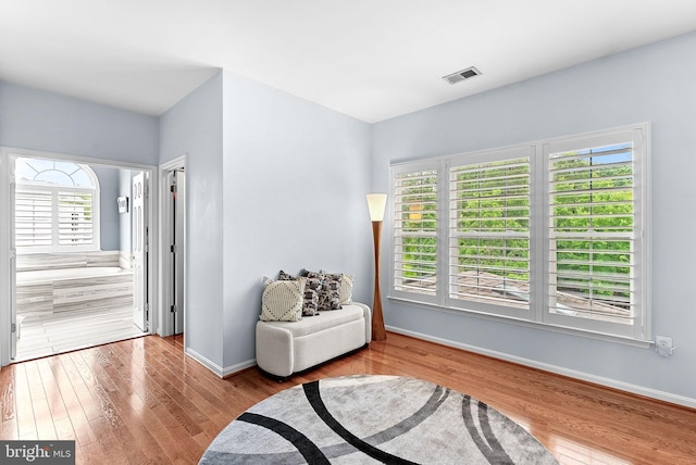 7633 Great Dover St, Gainesville, VA 20155 - sitting room with wood finished floors and baseboards