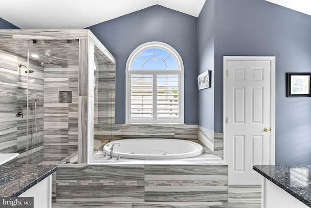 7633 Great Dover St, Gainesville, VA 20155 - bathroom with vanity, a whirlpool tub, a shower stall, and lofted ceiling