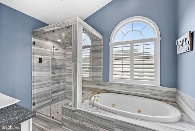 7633 Great Dover St, Gainesville, VA 20155 - bathroom with a shower stall, a jetted tub, and vanity