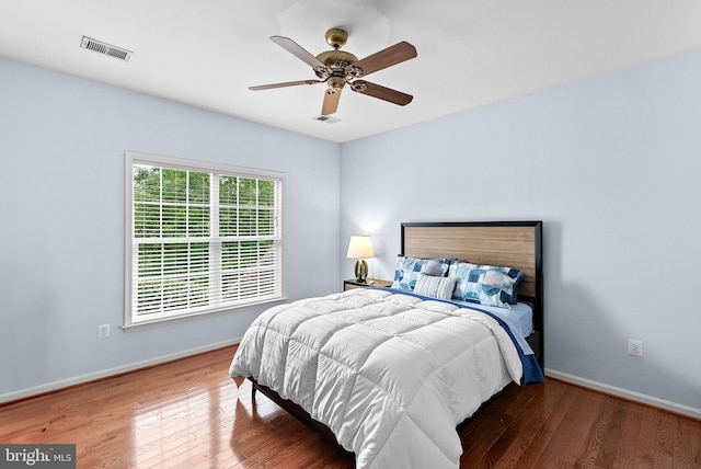 7633 Great Dover St, Gainesville, VA 20155 - bedroom with wood finished floors and ceiling fan