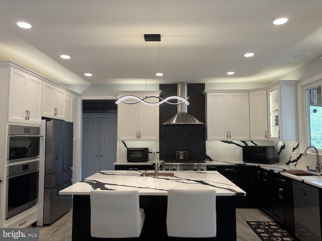 7633 Great Dover St, Gainesville, VA 20155 - kitchen with black appliances, a sink, decorative backsplash, wall chimney range hood, and recessed lighting