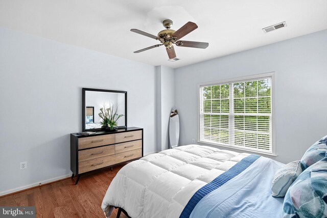 7633 Great Dover St, Gainesville, VA 20155 - bedroom featuring dark wood-style floors and a ceiling fan