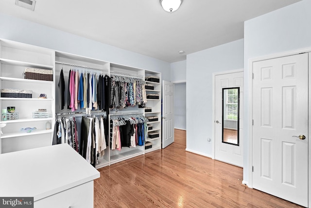 7633 Great Dover St, Gainesville, VA 20155 - walk in closet with wood finished floors