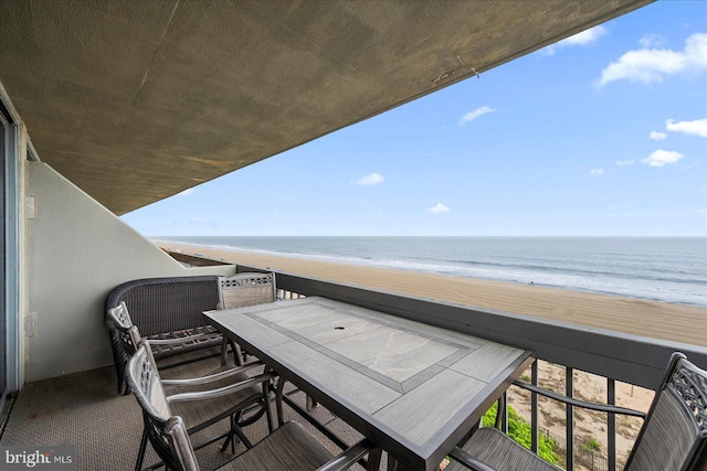 9900 Coastal Hwy Unit 401, Ocean City, MD 21842 - balcony with view of water and beach and outdoor dining area