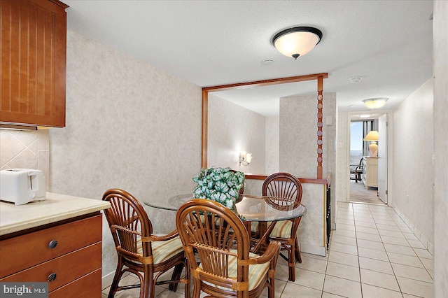 9900 Coastal Hwy Unit 401, Ocean City, MD 21842 - dining area featuring light tile patterned floors