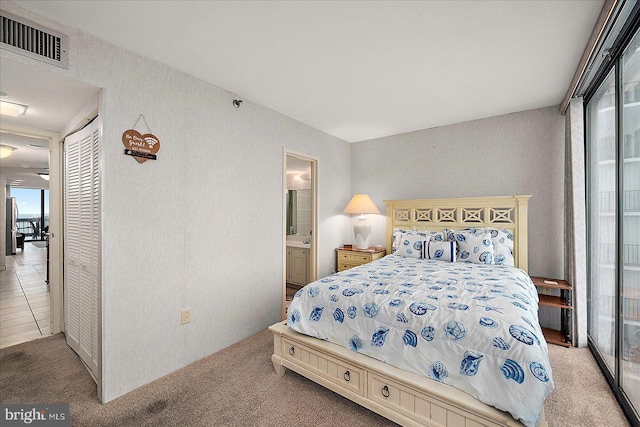 9900 Coastal Hwy Unit 401, Ocean City, MD 21842 - bedroom with multiple windows, light colored carpet, and a closet