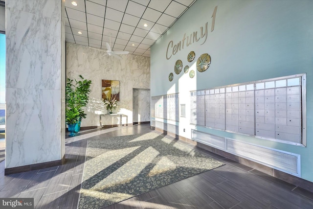 9900 Coastal Hwy Unit 401, Ocean City, MD 21842 - building lobby with a high ceiling and recessed lighting