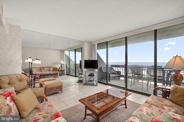 9900 Coastal Hwy Unit 401, Ocean City, MD 21842 - living area featuring floor to ceiling windows and light tile patterned flooring