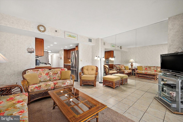 9900 Coastal Hwy Unit 401, Ocean City, MD 21842 - living room with wallpapered walls and light tile patterned flooring