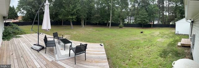 303 Ellendale Cir, Salisbury, MD 21804 - view of green lawn with a wooden deck