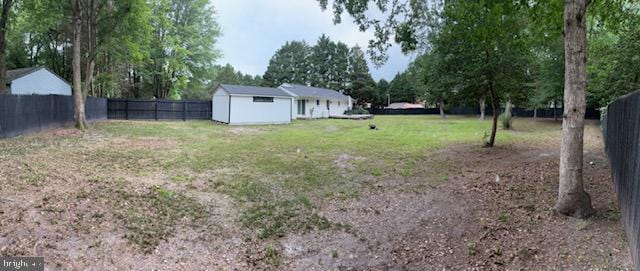 303 Ellendale Cir, Salisbury, MD 21804 - fenced backyard with an outdoor structure