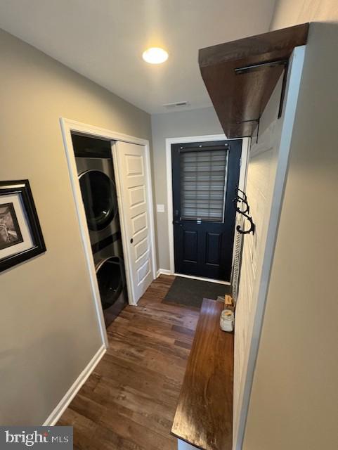 303 Ellendale Cir, Salisbury, MD 21804 - foyer featuring stacked washing machine and dryer and dark wood finished floors