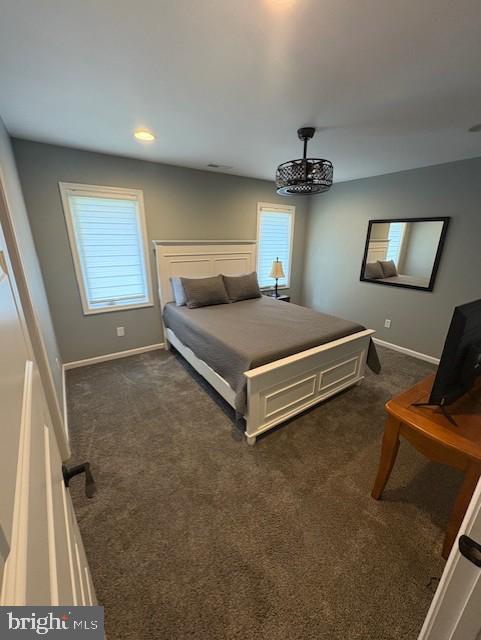 303 Ellendale Cir, Salisbury, MD 21804 - bedroom featuring dark colored carpet and baseboards