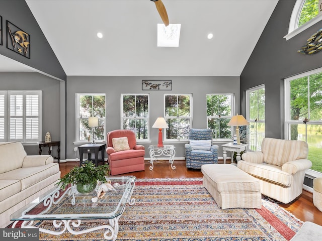 34897 Seagrass Plantation Ln, Dagsboro, DE 19939 - living room with high vaulted ceiling, a skylight, plenty of natural light, recessed lighting, and wood finished floors