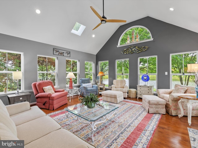 34897 Seagrass Plantation Ln, Dagsboro, DE 19939 - living room with ceiling fan, high vaulted ceiling, a skylight, recessed lighting, and wood finished floors