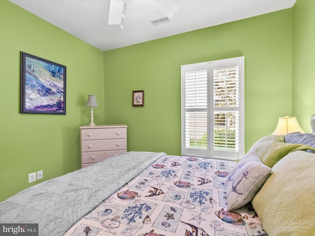 34897 Seagrass Plantation Ln, Dagsboro, DE 19939 - bedroom featuring multiple windows and ceiling fan