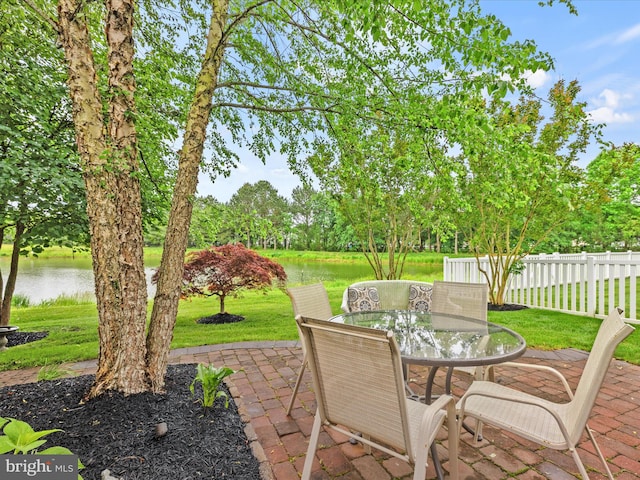 34897 Seagrass Plantation Ln, Dagsboro, DE 19939 - view of patio featuring a water view and outdoor dining space