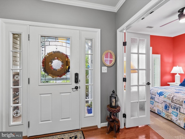 34897 Seagrass Plantation Ln, Dagsboro, DE 19939 - entryway with wood finished floors, crown molding, ceiling fan, and baseboards