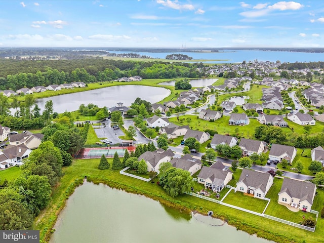 34897 Seagrass Plantation Ln, Dagsboro, DE 19939 - aerial perspective of suburban area with a large body of water