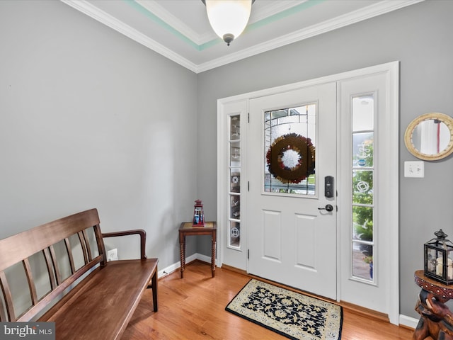 34897 Seagrass Plantation Ln, Dagsboro, DE 19939 - entrance foyer featuring light wood-style flooring, crown molding, and baseboards