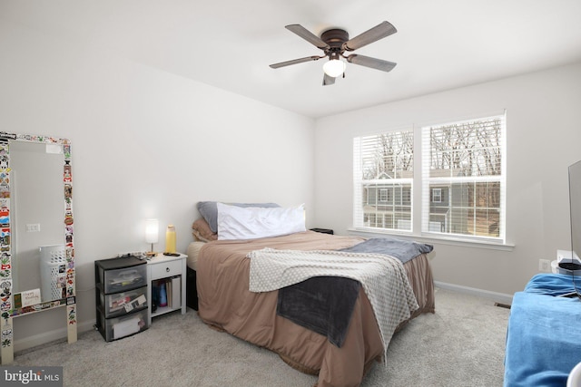 6293 Bobcat Ln, King George, VA 22485 - bedroom with carpet floors, baseboards, and a ceiling fan