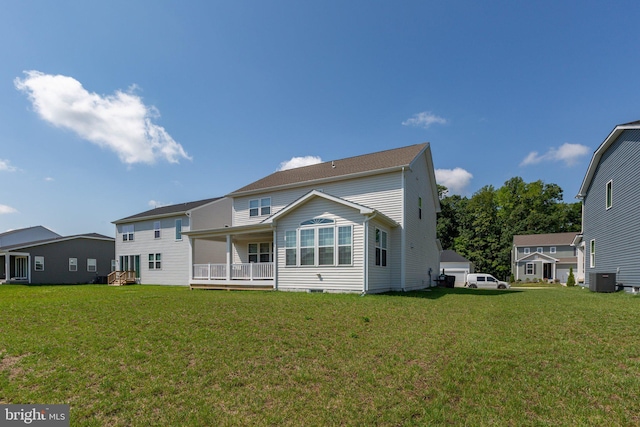 6293 Bobcat Ln, King George, VA 22485 - back of house with a yard and cooling unit