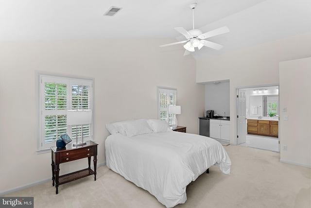 20783 Laplume Pl, Ashburn, VA 20147 - bedroom featuring light carpet, multiple windows, high vaulted ceiling, baseboards, and ensuite bath