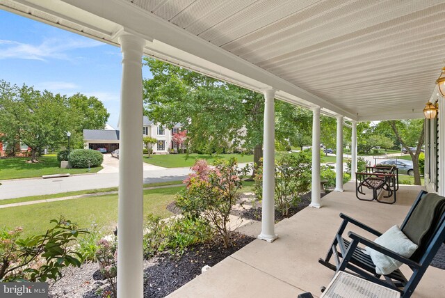 20783 Laplume Pl, Ashburn, VA 20147 - covered porch with a lawn
